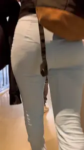 Nicely shaped college girl ass in blue pants