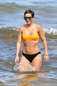 Frankie Bridge nip slips in a bikini on the beach