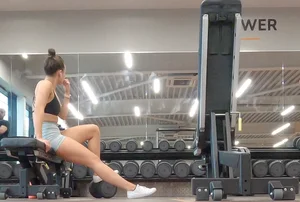 Gym brunette in tight grey shorts bending over, part 3