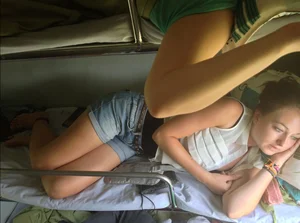 Hot legs, girl in shorts in a train
