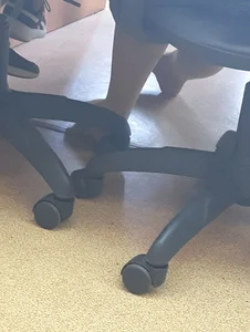 College Teen's Feet in Pantyhose With Her Sneakers Taken Off Creepshots Gallery
