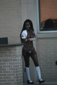 Sexy ebony Tilted Kilt employee in her uniform