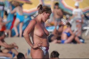 Girls on a nude beach in Bibione, Italy