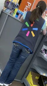 Very skinny working girl wearing tight jeans