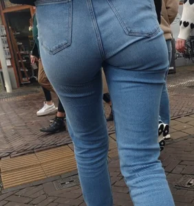 Nice looking girl with a little sexy bubble ass in tight jeans