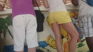 Milf in yellow shorts with vpl and a wedgie