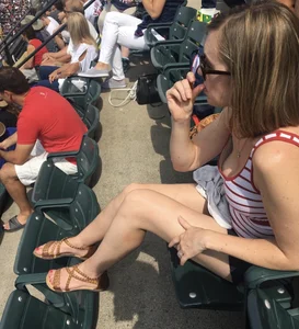 Skinny Legs and Feet in Sandals at the Stadium Creepshot