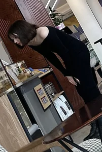 Brunette college girl with a perfect ass in a very tight dress