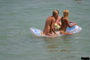 Beach voyeur babes in bikinis, thongs and topless