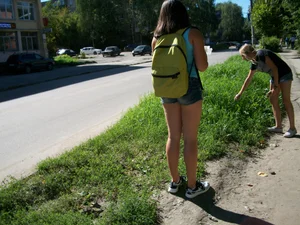 Chubby Teen with Her Thin Friend in Jeans Shorts on the Suburb Street
