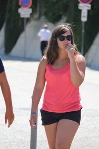 Thick girl in pink top and black shorts with vpl