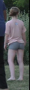 Nerdy blonde teen plays in tight short shorts