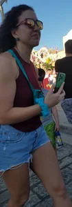 Laughing girl in shorts, legs and thick peach