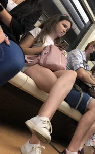 Cute Teen Girl in Shorts in Subway Train Candid Photos