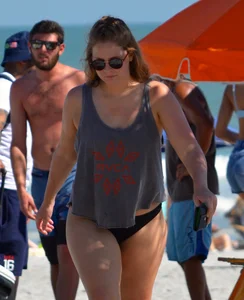 Chubby white girls in bikinis on the beach