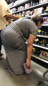 Beautiful Latina with amazing body in long dress