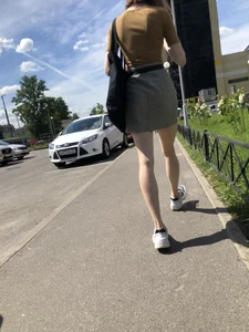 Candid Girl in a Skirt With Very Thin Hot Legs Walking on a Street Creepshots