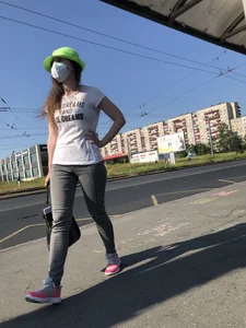 Nice candid girl wearing tight grey sweatpants, a mask and a hat