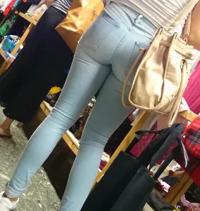 Girl shopping in light colored tight jeans with a nice ass