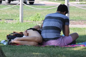 Cutie at the park upskirted showing her white panties