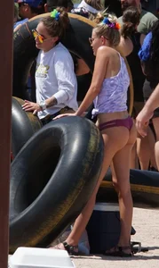 Girls in bikinis getting ready for tubing