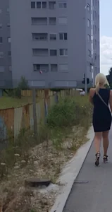 Candid hot blonde with sexy legs and body wearing tight black dress and High Heel wedges