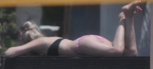 Resort Tan in pink bikini