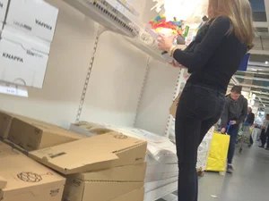 Skinny girl shopping in tight black jeans