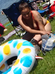 Thick girl with tattoos, big tits and a big booty in a little bikini