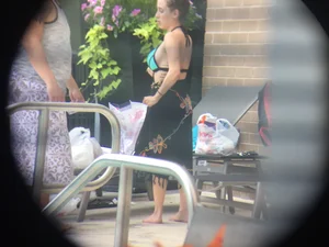 Hot girl at the pool in her bikini with big tits