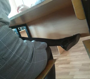 Crossed Skinny Legs in Black Pantyhose Under College Desk Creepshot