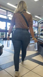 Pawg blonde filling out jeans. Slight VPL