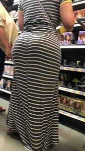 Beautiful Latina with amazing body in long dress