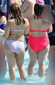 Two thick milfs at the pool in bikinis