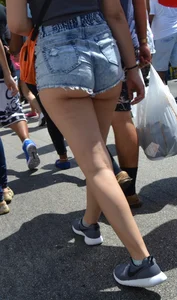 Thick booty babe in denim shorts showing her cheeks