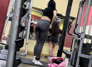Latina pulls her leggings up then bends over for me