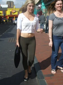 Sexy blonde out walking in green leggings with vpl
