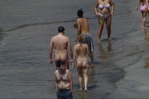 Girls on a nude beach in Sitges, Spain