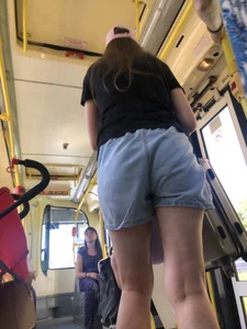 Candid teen in shorts public bus creepshots