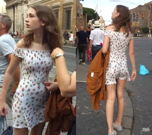 Adorable candid girl in a short dress on the street