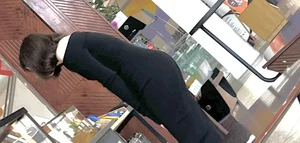 Brunette college girl with a perfect ass in a very tight dress