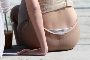 Redhead looking beautiful and sexy in tight pants with a nice ass and showing her panties