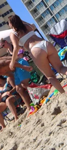 Big booty teen at the beach in a white bikini