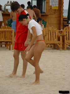 Beach voyeur girls in bikinis, thongs and topless