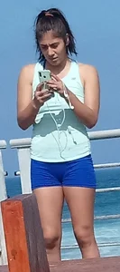 Athletic babe in blue spandex shorts with a nice ass