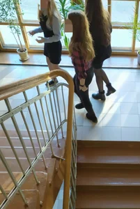 Group of Candid Young College Girls Walking Down a Corridor And on a Stairs