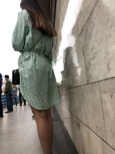 Girl in a Dress With Sexy Legs in Subway and on a Street