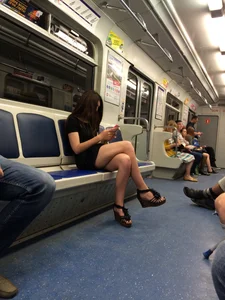Hot Girl With Gorgeous Legs in a Dress and High Heeled Sandals in a Subway Train And on a Street