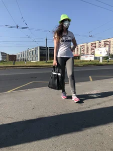 Nice candid girl wearing tight grey sweatpants, a mask and a hat