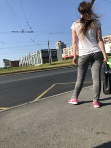 Nice candid girl wearing tight grey sweatpants, a mask and a hat